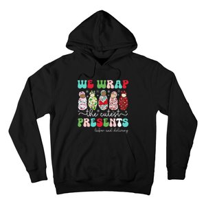 Fun We Wrap The Cutest Presents Labor And Delivery Christmas Hoodie