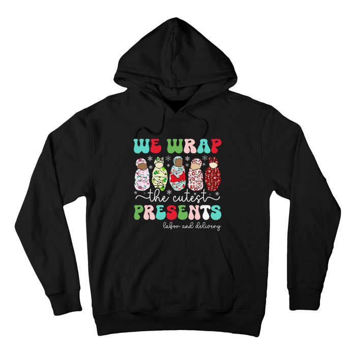 Fun We Wrap The Cutest Presents Labor And Delivery Christmas Hoodie