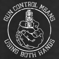 Gun Control Means Using Both Hands 7 Panel Mesh Trucker Snapback Hat