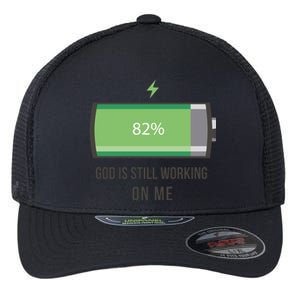 God Is Still Working On Me Battery Loading Flexfit Unipanel Trucker Cap