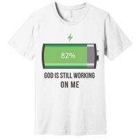 God Is Still Working On Me Battery Loading Premium T-Shirt