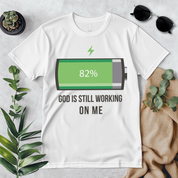 God Is Still Working On Me Battery Loading Premium T-Shirt