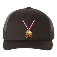 Golden Medal For Winners School Team And Champions Yupoong Adult 5-Panel Trucker Hat