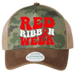 Groovy Red Ribbon Week We Wear Red For Awareness Legacy Tie Dye Trucker Hat