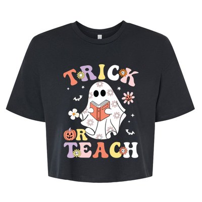 Groovy Teacher Halloween Trick Or Teach Retro Floral Ghost Bella+Canvas Jersey Crop Tee