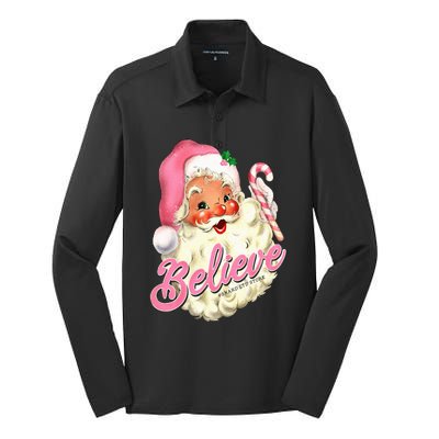 Groovy Vintage Pink Santa Claus Believe Christmas Silk Touch Performance Long Sleeve Polo