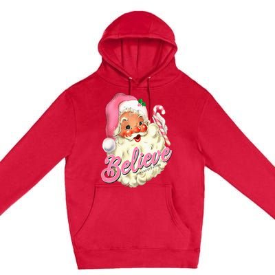 Groovy Vintage Pink Santa Claus Believe Christmas Premium Pullover Hoodie