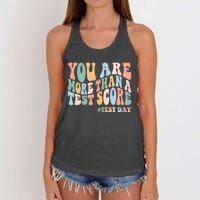 Groovy You Are More Than A Test Score Teacher Testing Day Women's Knotted Racerback Tank