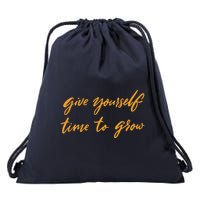 Give Yourself Time To Grow Quote Drawstring Bag