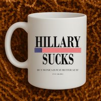 Hillary Clinton Sucks But Monica Is Way Better At It Mug