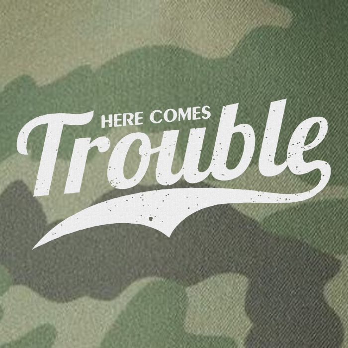 Here Comes Trouble Funny Trouble Maker Legacy Tie Dye Trucker Hat
