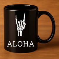 Halloween Hang Loose Skeleton Shaka Aloha – Over Left Breast 11oz C Handle Ceramic Mug