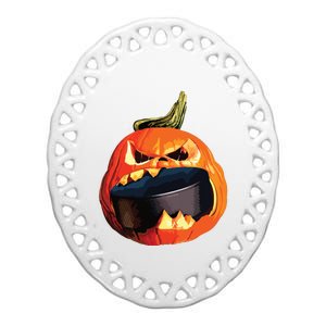 Halloween Hockey Pumpkin Eating A Puck Ceramic Oval Ornament