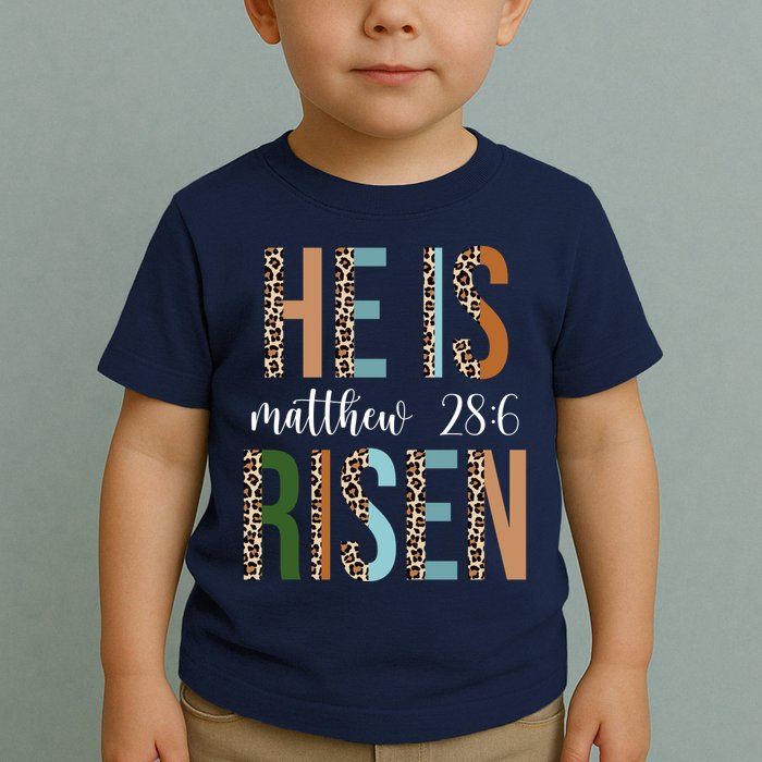 He Is Risen Matthew Bible Verse Toddler T-Shirt