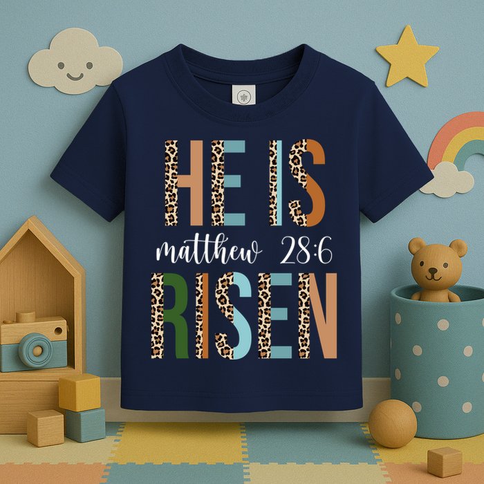 He Is Risen Matthew Bible Verse Toddler T-Shirt