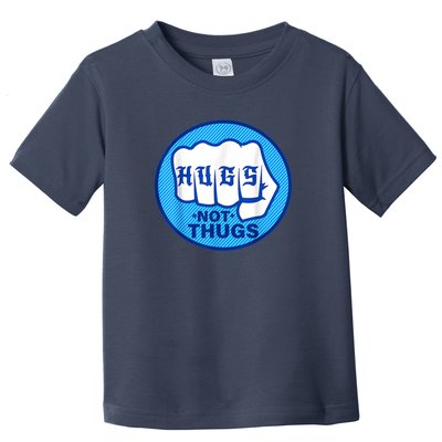 HUGS NOT THUGS Toddler T-Shirt