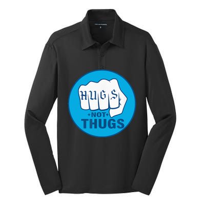 Hugs Not Thugs Silk Touch Performance Long Sleeve Polo