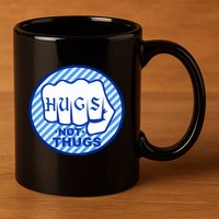 HUGS NOT THUGS 11oz C Handle Ceramic Mug