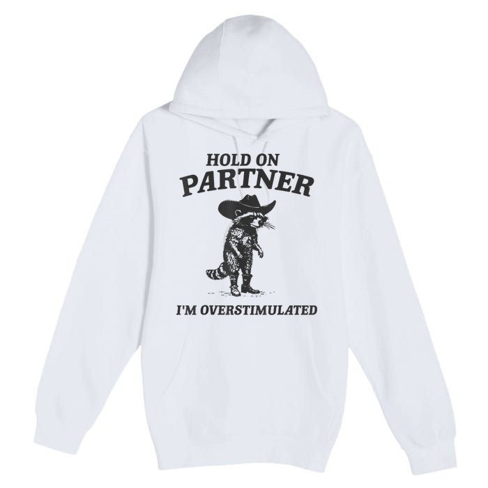 Hold On Partner IM Overstimulated Cowboy Raccoon Vintage Premium Pullover Hoodie