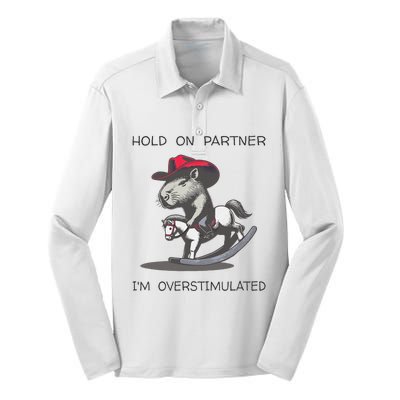 Hold On Partner I Am Overstimulated Funny Capybara Silk Touch Performance Long Sleeve Polo