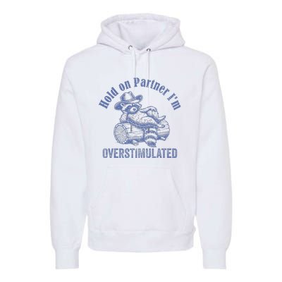 Hold On Partner IM Overstimulated Cowboy Raccoon Vintage Premium Hoodie