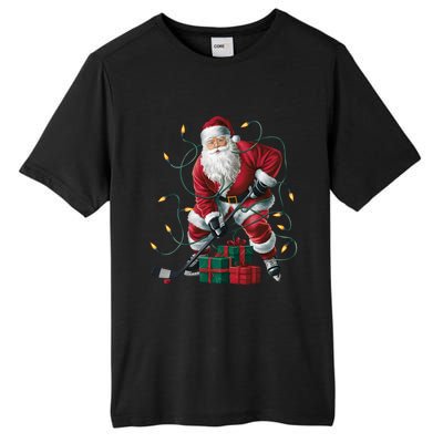 Hockey Player Xmas Lighting Santa Playing Hockey Christmas Gift Tall Fusion ChromaSoft Performance T-Shirt