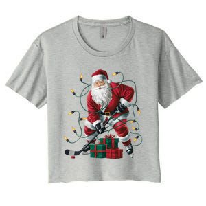 Hockey Player Xmas Lighting Santa Playing Hockey Christmas Gift Women's Crop Top Tee