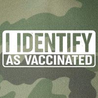 I Identify As Vaccinated Legacy Tie Dye Trucker Hat