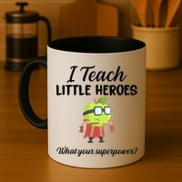 I Teach Little Heroes Mug