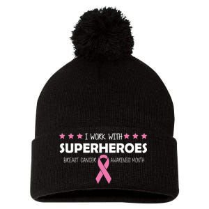 I Work With Superheroes Breast Cancer Awareness Month Pom Pom 12in Knit Beanie