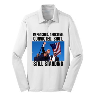 Impeached Arrested Convicted Shot Still Standing Us Flag Silk Touch Performance Long Sleeve Polo