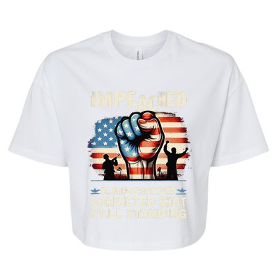 Impeached Arrested Convicted Shot Still Standing Bella+Canvas Jersey Crop Tee