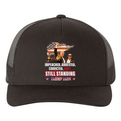 Impeached Arrested Convicted Shot Still Standing Trump 2024 Yupoong Adult 5-Panel Trucker Hat