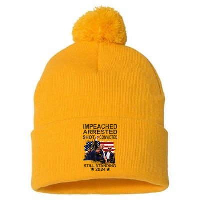 Impeached Arrested Convicted Shot Still Standing Pom Pom 12in Knit Beanie