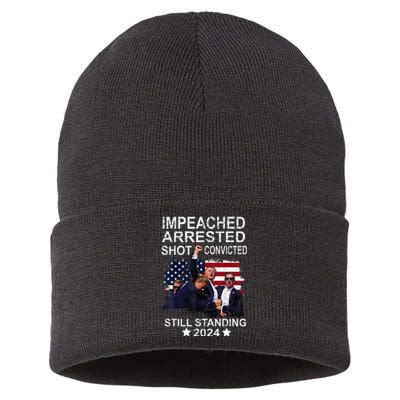 Impeached Arrested Convicted Shot Still Standing Sustainable Knit Beanie