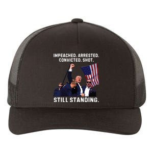 Impeached Arrested Convicted Shot Still Standing Trump 2024 Yupoong Adult 5-Panel Trucker Hat