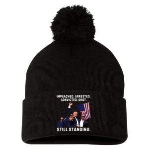 Impeached Arrested Convicted Shot Still Standing Trump 2024 Pom Pom 12in Knit Beanie