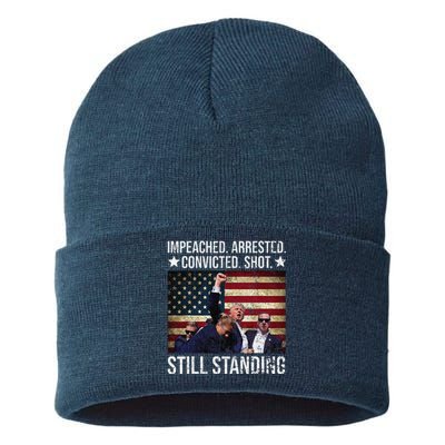 Impeached Arrested Convicted Shot Still Standing Sustainable Knit Beanie