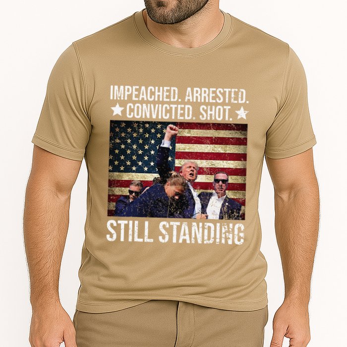 Impeached Arrested Convicted Shot Still Standing Cooling Performance Crew T-Shirt