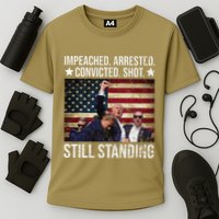 Impeached Arrested Convicted Shot Still Standing Cooling Performance Crew T-Shirt