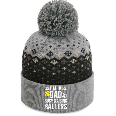 IM A Dad Busy Raising Ballers Soccer Softball Dad Gift The Baniff Cuffed Pom Beanie