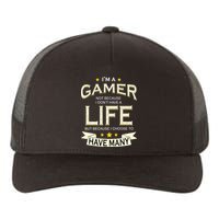 I'm A Gamer Not Because I Don't Have A Life But I Have Many Yupoong Adult 5-Panel Trucker Hat