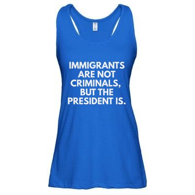 Immigrants Are Not Criminals But The President Is Ladies Essential Flowy Tank