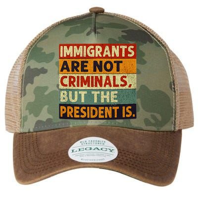 Immigrants Are Not Criminals But The President Is Funnyy Legacy Tie Dye Trucker Hat