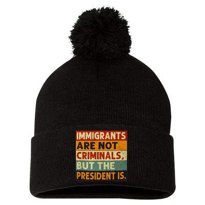 Immigrants Are Not Criminals But The President Is Funnyy Pom Pom 12in Knit Beanie