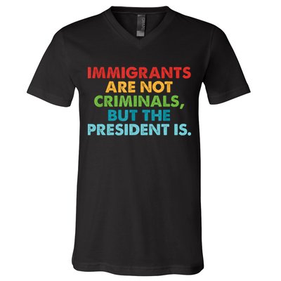 Immigrants Are Not Criminals But The President Is Design  V-Neck T-Shirt