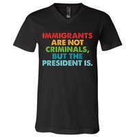 Immigrants Are Not Criminals But The President Is Design  V-Neck T-Shirt