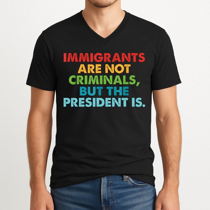 Immigrants Are Not Criminals But The President Is Design  V-Neck T-Shirt