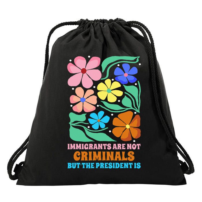 Immigrants Are Not Criminals But The President Is  Drawstring Bag