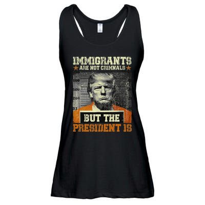Immigrants Are Not Criminals But The President Is Funny Ladies Essential Flowy Tank